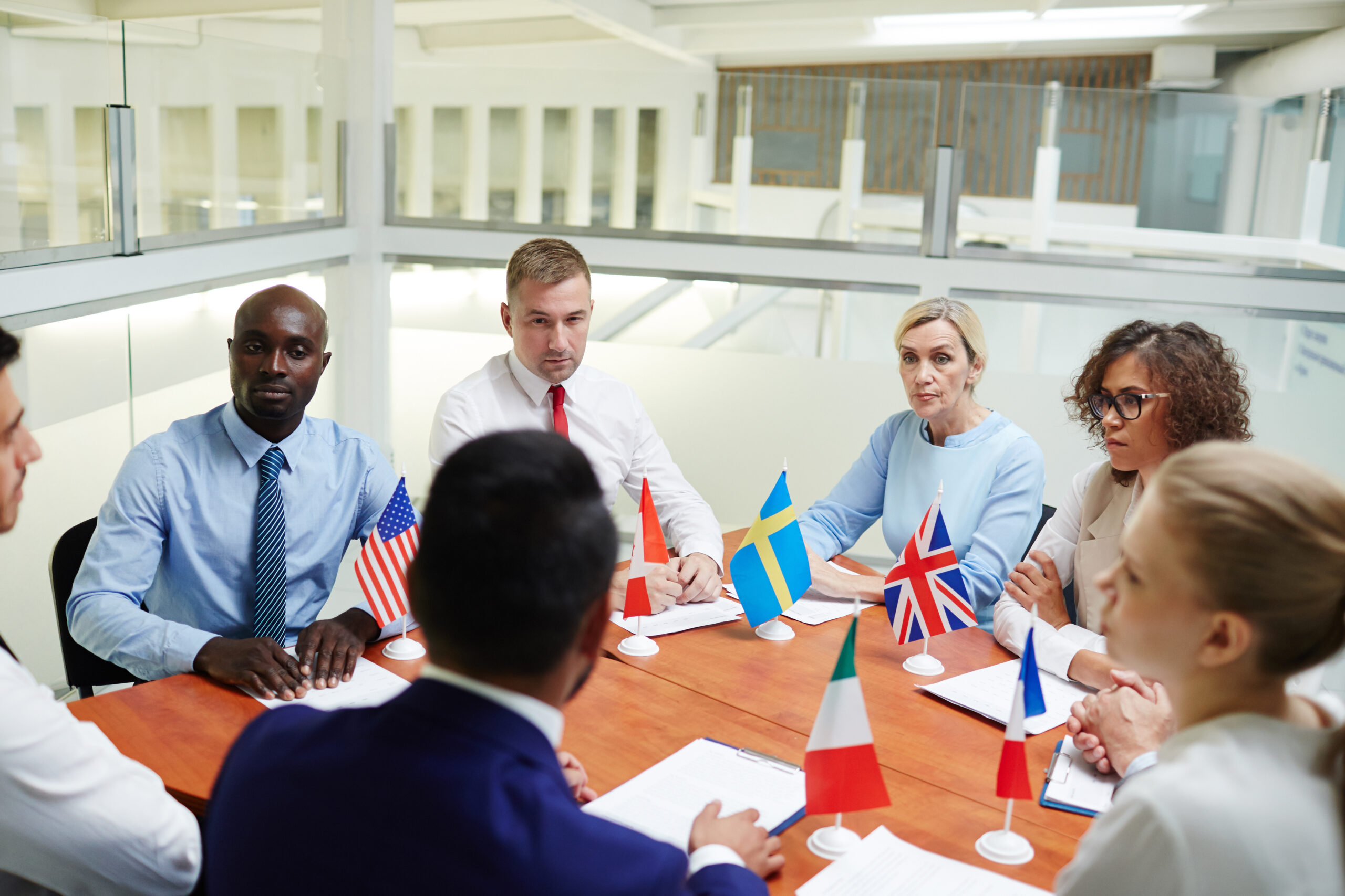 international-business-meeting-around-table-in-off-2026-01-09-08-16-11-utc-scaled
